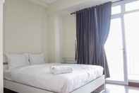 Bedroom Studio Homey with City View Apartment at Puri Orchard By Travelio