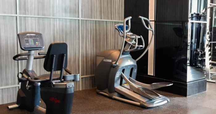 Fitness Center 1BR Modern Design Apartment at Brooklyn Alam Sutera By Travelio