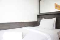 Kamar Tidur Chic Studio Apartment at Harvard Jatinangor By Travelio