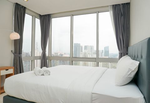 Phòng ngủ 2BR Elegant at The Empyreal Condominium Epicentrum Apartment By Travelio