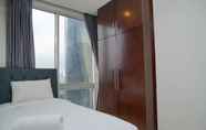 Kamar Tidur 6 2BR Elegant at The Empyreal Condominium Epicentrum Apartment By Travelio