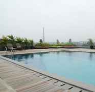 Swimming Pool 3 Highest Value 1BR at Tree Park BSD Apartment By Travelio