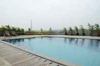 Swimming Pool Highest Value 1BR at Tree Park BSD Apartment By Travelio