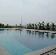 Swimming Pool 4 Highest Value 1BR at Tree Park BSD Apartment By Travelio