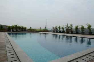 Swimming Pool 4 Highest Value 1BR at Tree Park BSD Apartment By Travelio