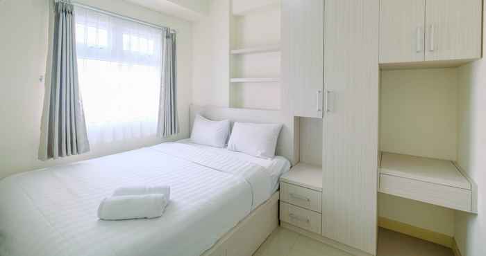 Bedroom Chic and Cozy 2BR at Green Pramuka Apartment By Travelio