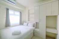 Bedroom Chic and Cozy 2BR at Green Pramuka Apartment By Travelio