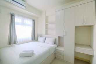 Kamar Tidur 4 Chic and Cozy 2BR at Green Pramuka Apartment By Travelio