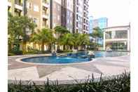 Kolam Renang Comfy 2BR Apartment at Silkwood Residence By Travelio