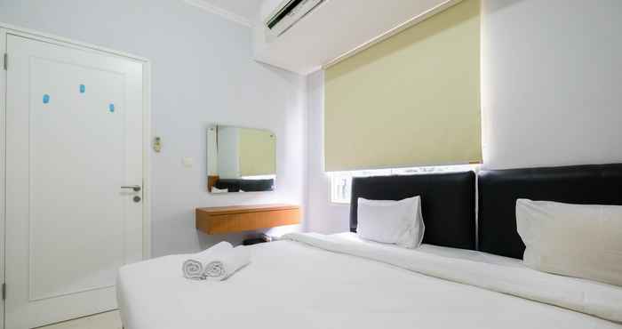 Kamar Tidur Comfy 2BR Apartment at Silkwood Residence By Travelio