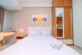 Kamar Tidur 4 Studio Homey and Relaxing at Grand Dhika City Apartment By Travelio