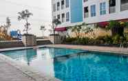 Swimming Pool 3 Studio Homey and Relaxing at Grand Dhika City Apartment By Travelio