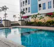 Swimming Pool 3 Studio Homey and Relaxing at Grand Dhika City Apartment By Travelio