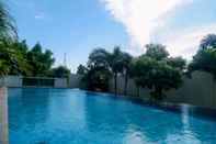 Kolam Renang 1BR Homey and Comfortable Apartment at Royal Olive Residence By Travelio