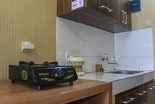 Common Space Studio Affordable Price at Sky View Apartment By Travelio