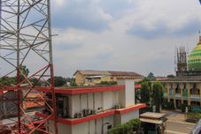 Nearby View and Attractions Studio Affordable Price at Sky View Apartment By Travelio