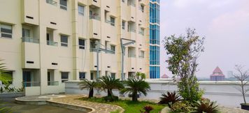 Lobi 4 2BR Homey and Modern Apartment at Atlanta Residence By Travelio