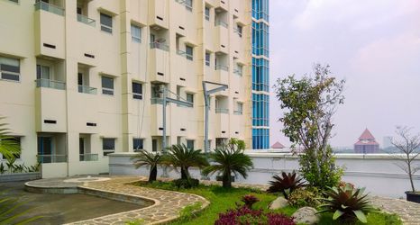 Lobi 2 2BR Homey and Modern Apartment at Atlanta Residence By Travelio