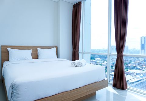 Bedroom 2BR Homey and Modern Apartment at Atlanta Residence By Travelio