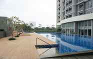 Swimming Pool 3 Graceful 1BR Ciputra International By Travelio