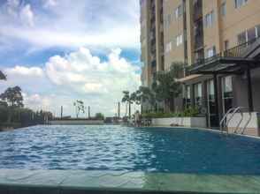 Kolam Renang 4 Studio Affordable Price Apartment at The Oasis Cikarang By Travelio