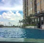 Swimming Pool 4 Studio Affordable Price Apartment at The Oasis Cikarang By Travelio