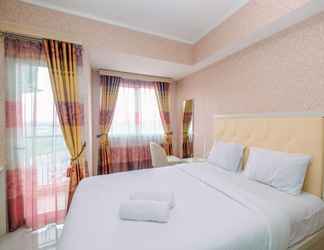 Bedroom 2 Studio Affordable Price Apartment at The Oasis Cikarang By Travelio