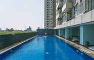 Kolam Renang 2 Functional and Compact 1BR Belmont Apartment By Travelio