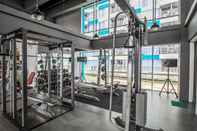 Fitness Center 1BR Modern Apartment with City View at H Residence By Travelio