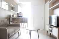 Lobi 2BR Zestful Apartment at Parahyangan Residence By Travelio