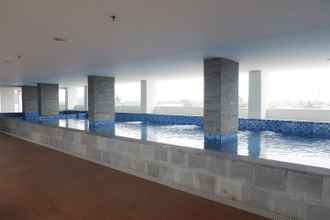 Swimming Pool 4 Studio Minimalist Apartment at Poris 88 with City View By Travelio