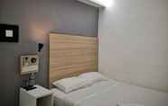 Kamar Tidur 5 Dragon Door Hotel