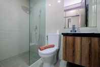 In-room Bathroom 2BR Spacious at Ciputra International Apartment By Travelio