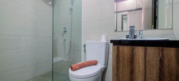 In-room Bathroom 6 2BR Spacious at Ciputra International Apartment By Travelio