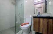 Toilet Kamar 6 2BR Spacious at Ciputra International Apartment By Travelio