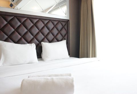 Bedroom Studio Prime and Cozy Deluxe Tamansari La Grande Apartment By Travelio