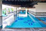 Swimming Pool Studio Prime and Cozy Deluxe Tamansari La Grande Apartment By Travelio