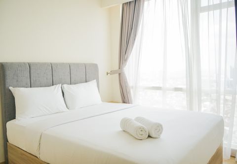 Bedroom 2BR Chic and Cozy Apartment at Menteng Park By Travelio