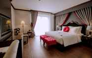 Kamar Tidur 4 The Scarlett Boutique Hotel