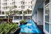 Swimming Pool Fabulous Style Studio at Bintaro Icon Apartment By Travelio