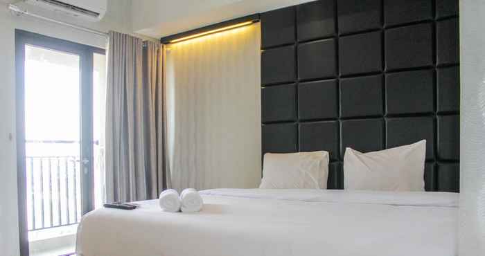 Bedroom Minimalist Studio Apartment at Atria Residences with Pool View By Travelio