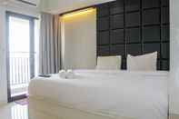 Bedroom Minimalist Studio Apartment at Atria Residences with Pool View By Travelio