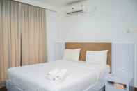 Bedroom Homey and Modern Tamansari Semanggi 2BR Apartment By Travelio