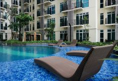 Swimming Pool 3 Minimalist New Furnished 1BR at Puri Orchard Apartment By Travelio