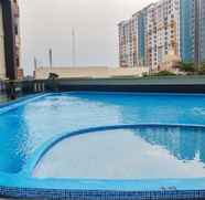 Swimming Pool 4 Best Studio Apartment at Atria Residence near Mall By Travelio