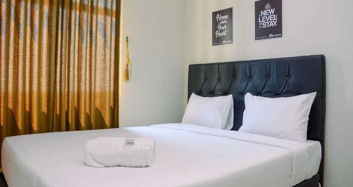 Kamar Tidur Cozy 2BR Apartment at Gading Greenhill near Kelapa Gading Mall By Travelio