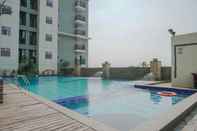 Swimming Pool Cozy 2BR Apartment at Gading Greenhill near Kelapa Gading Mall By Travelio