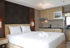 Lobi 4 Deluxe Studio room at La Grande Tamansari Apartment By Travelio