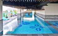 Swimming Pool 3 Deluxe Studio room at La Grande Tamansari Apartment By Travelio