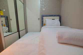 Bedroom 4 Emerald 2BR Apartment Gading Nias By Travelio